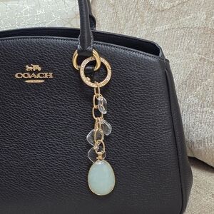 Coach Black Leather Handbag with Gold Accents